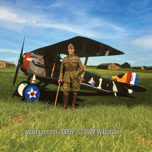 Collectible toy soldier miniature Captain Eddie Rickenbacker American Aviator. Standing in front of airplane.