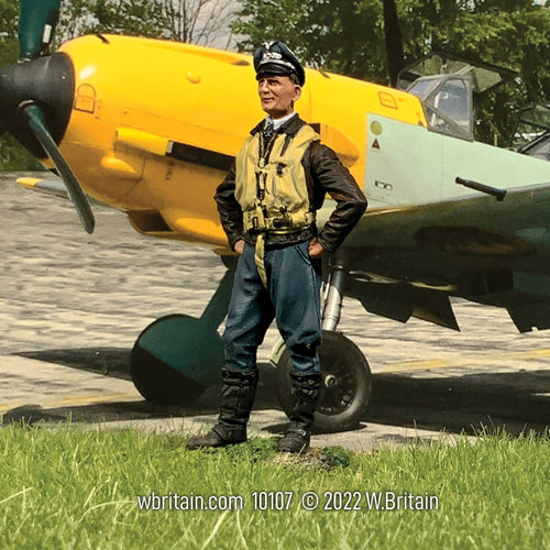 Collectible toy soldier army men Luftwaffe Fighter Pilot 1939-45. Standing near his plane.