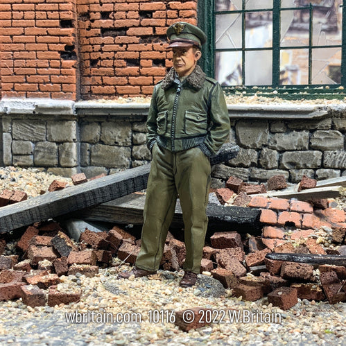 Toy soldier army men General Dwight D. Eisenhower Winter 1944-45. Standing near brick wall.