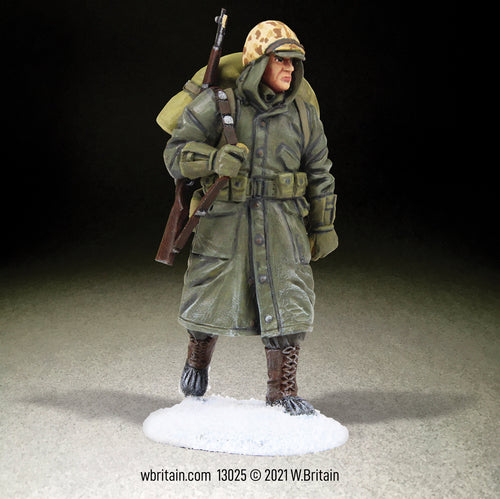 Collectible toy soldier miniature U.S. Marine Rifleman Korea. He is in winter uniform and the snow. 