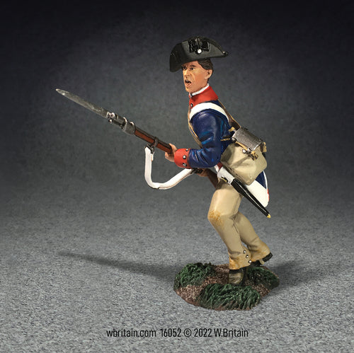 Collectible toy soldier miniature Continental Line Charging No.2. Soldier is in Continental uniform charging with musket and bayonet.