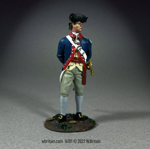 Collectible to soldier Standing at ease wearing a blue jacked and armed with a sword.