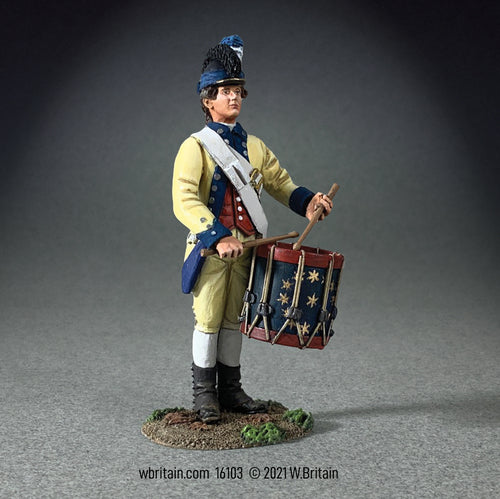 Collectible toy soldier miniature Washington's bodyguard drummer. Wearing a yellow uniform and holding a drum.