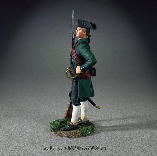 Collectible toy soldier miniature Major John Buttrick. He has a musket and sword.