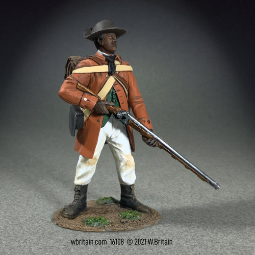 Collectible toy soldier miniature Black Militia man standing with a musket.