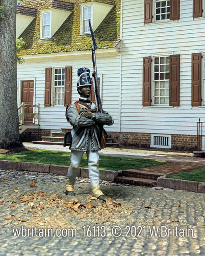Collectible toy soldier miniature Rhode Island Regiment. Black soldier marching.