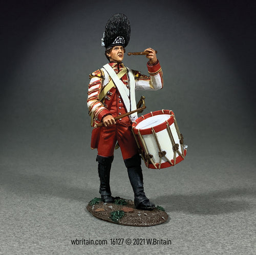 Collectible toy soldier miniature 43rd regiment of foot drummer marching.