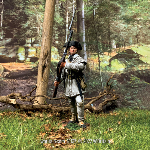 Collectible toy soldier miniature in white uniform holding a musket and bayonet.