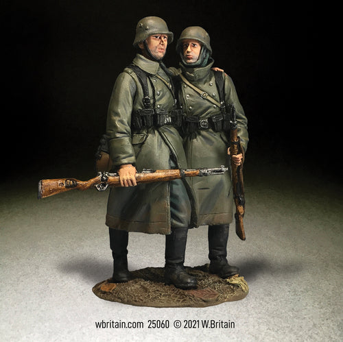 Toy soldier army men set German Helping Wounded Comrade in Greatcoat.