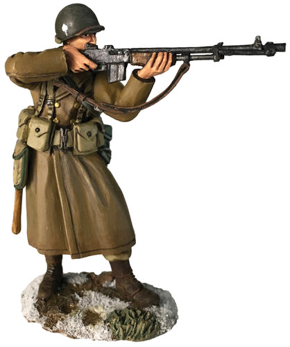 Toy soldier U.S. 101st Airborne in Greatcoat Standing Firing.