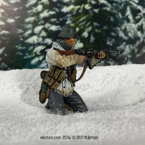 Toy soldier miniature army men German Grenadier in Parka Kneeling in the snow.