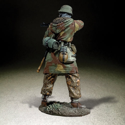 Rear view of Collectible toy soldier miniature army men German Waffen SS in Italian Camo.