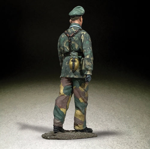 Rear view of Toy soldier miniature army men Waffen SS Hauptscharfuhrer Walking.