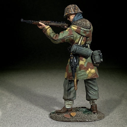 Side view of Waffen SS in Italian Camo Standing Firing.