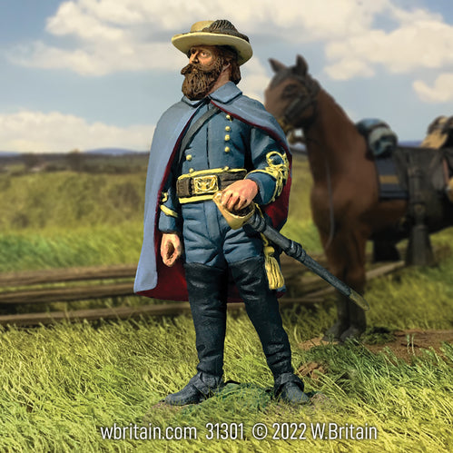 Collectible toy soldier miniature Confederate General J.E.B. Stuart. He is in a field with his horse.