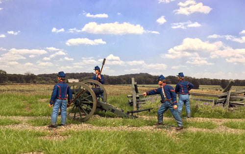 Collectible toy soldier miniature Artillery Firing 10-Pound Parrott Gun. Soldiers firing cannon in a field.