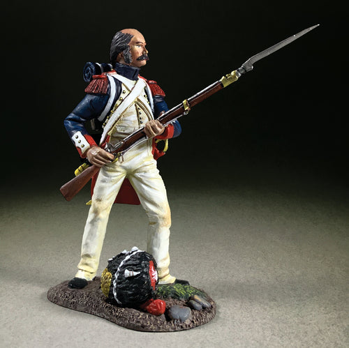 Collectible toy soldier miniature "Near Miss!" French Imperial Guard. Hat is on the ground.