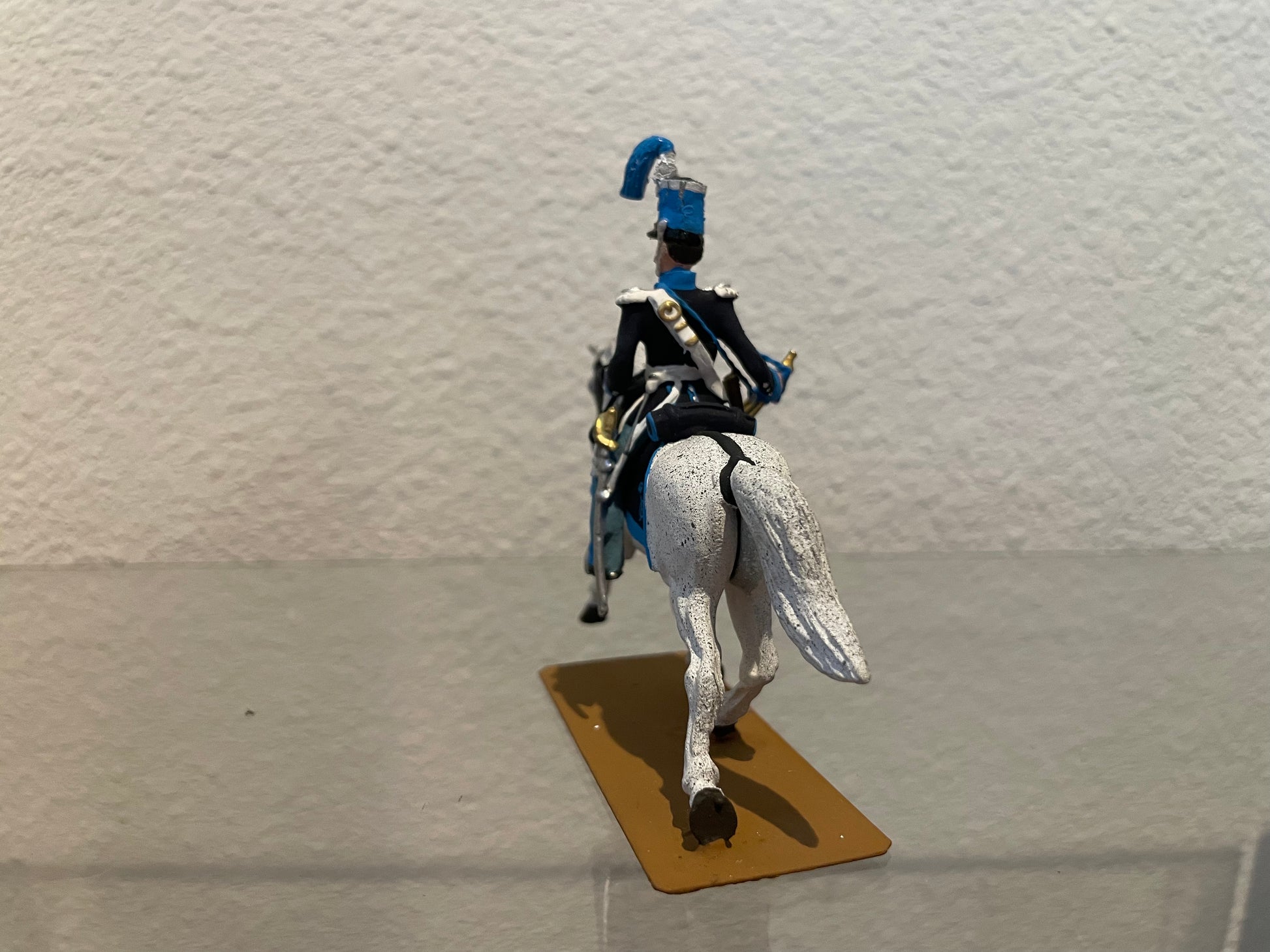 Rear view of Collectible toy soldier miniature Cavalrymen of Sardinia.